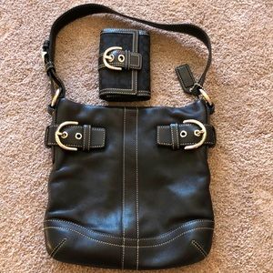 Black coach purse with white stitching